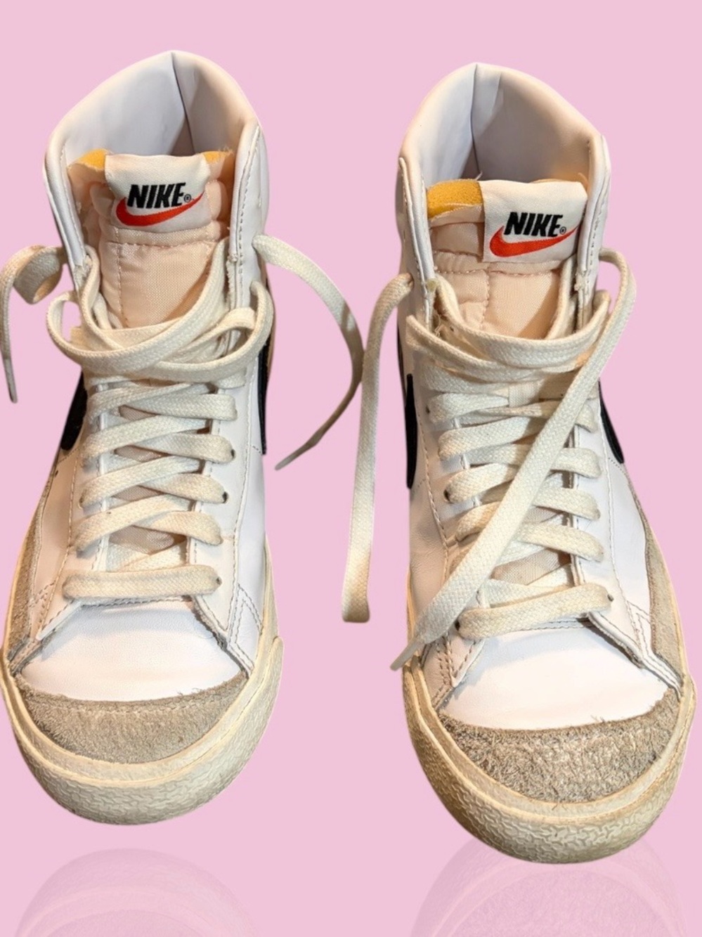 Nike Women’s White High-Top Sneakers with Black Swoosh and Orange Tongue Tab